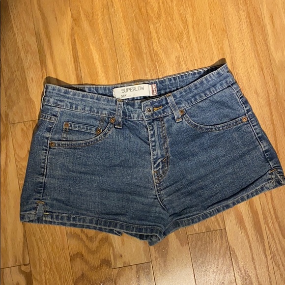 Levi's Pants - Levi’s 518 super low shorts in medium wash size 7